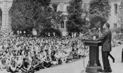 Dr. Martin Luther King, Jr. speaks at outdoor event