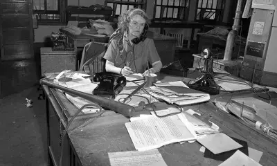 Agness "Aggie" Underwood at her desk in 1949
