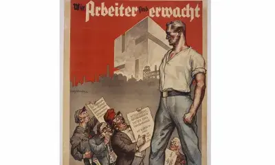 1932 election poster shows the German worker, enlightened through National Socialism, towering over his opponents