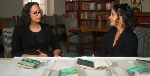 Amanda Charles and Candacy Taylor in the rare books room