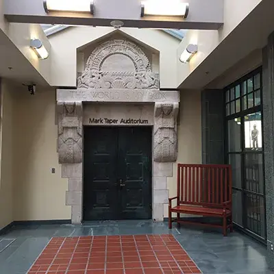 Lawrie’s original gateway to the Children’s Garden reads “The World is my Book”