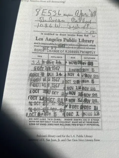 black & white photo of old library card