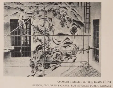 Artist Charles Kassler Jr. on scaffolding in front of Bison Hunt