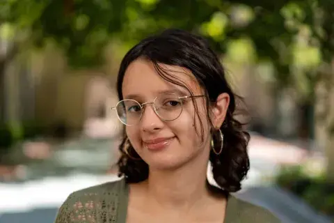 Lila, a library apprentice.