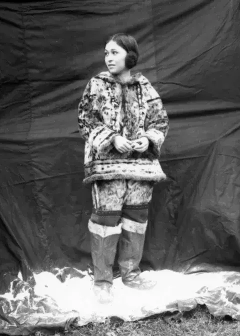Nancy Columbia, dressed warmly in an Eskimo tog