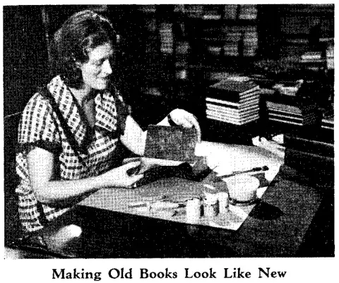 A woman, part of a work relief project fixes books