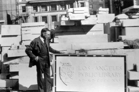 Carleton M. Winslow admires the Central Library cornerstone