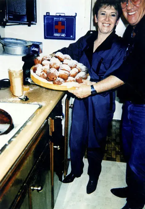 Sorrina and Marcel Yitzak prepare for a Hanukkah party