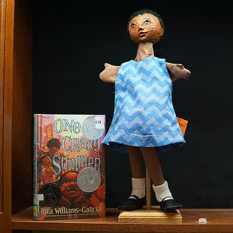 puppet from the book One Crazy Summer