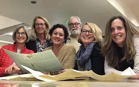 Glen with group of lady archivists