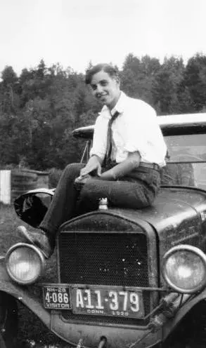Richard Brandon sitting on the hood of the puppeteers