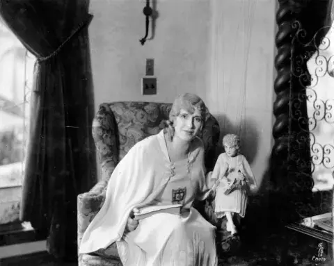 Angelus Temple evangelist Aimee Semple McPherson with her look-alike puppet.
