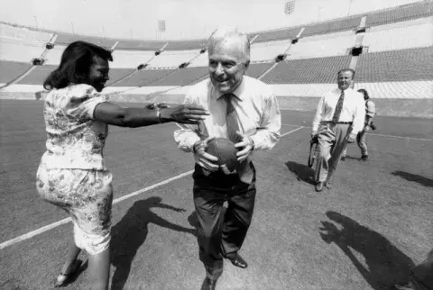 Richard Riordan with football