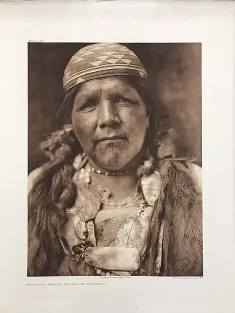 Nativa American Hupa Shaman woman, looking straight into the camera
