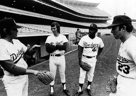 Dodger pitchers Pete Richert, Don Sutton, Al Downing and Claude Osteen take the field. 