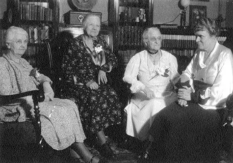 4 City Librarians of the Los Angeles Public Library. Left to right: Mary L. Jones, Mary E. Foy, Harriet Child Wadleigh, Althea Warren. Photo taken at the home of Mrs. Wadleigh, 1415 S. Hope St. (April, 1934) 