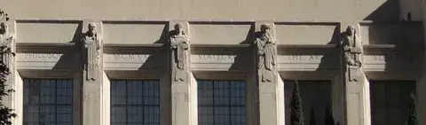 Busts of Socrates, Emperor Justinian, Leonardo da Vinci and Copernicus on the Hope Street facade of the Goodhue Building