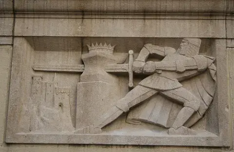 Reliefs of The Sword in the Stone and The Cow Jumped Over the Moon from the Children’s Courtyard