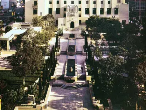 View of Maguire Gardens with library in background
