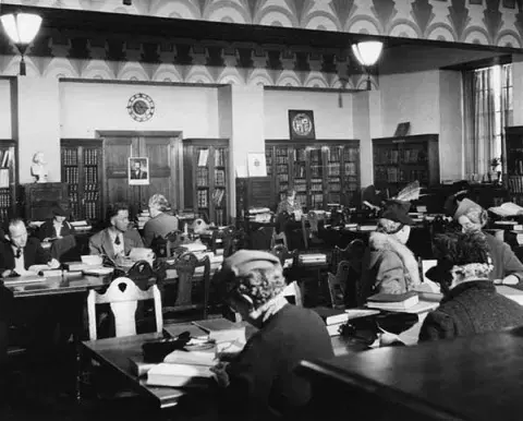 historic photo of interior of library reading room