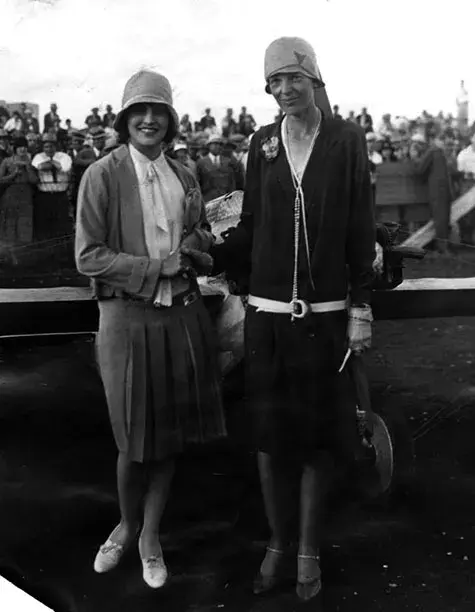 Miss Amelia Earhart (right) and Ruth Elder meet for the first time, 1928 air race. 