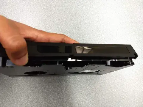 Photo showing VHS-C inside adapter from top