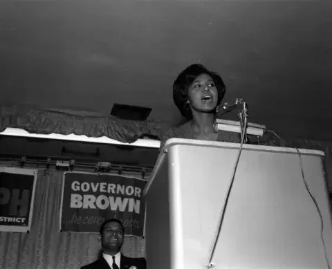 Yvonne Brathwaite Burke at podium