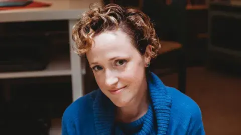 Keetje Kuipers in a blue sweater