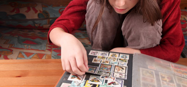 person collecting stamps