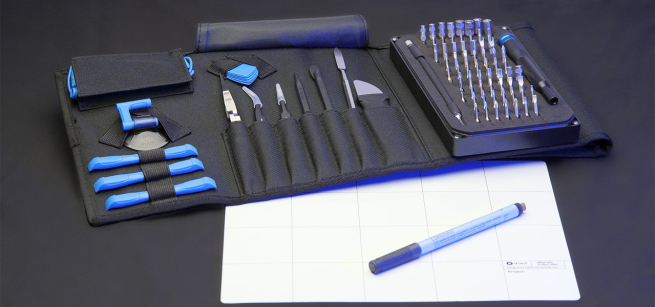 An array of small tools neatly organized in a small pouch.