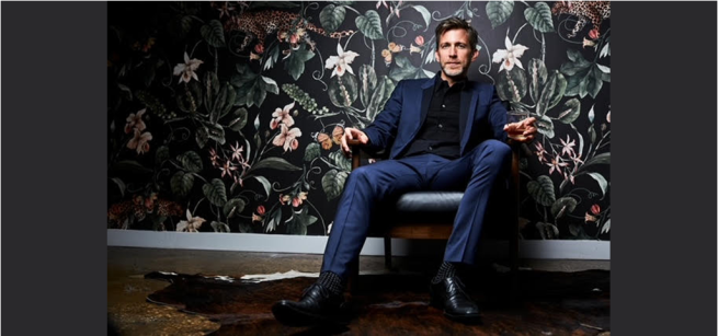 Ben Eakley seated on a chair