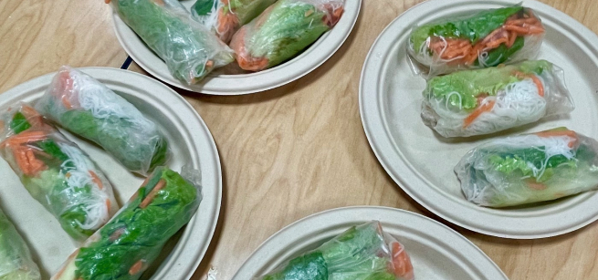 Several plates of fresh Vietnamese Spring Rolls.