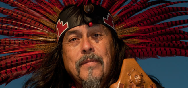 man in native american headdress