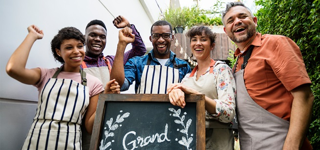 Several Men and Women waving hello