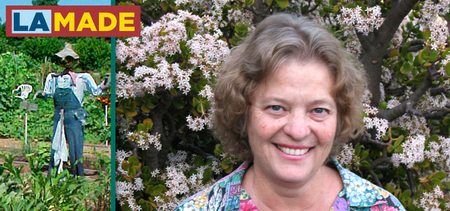 Master Gardener, Yvonne Savio. A garden in the background.
