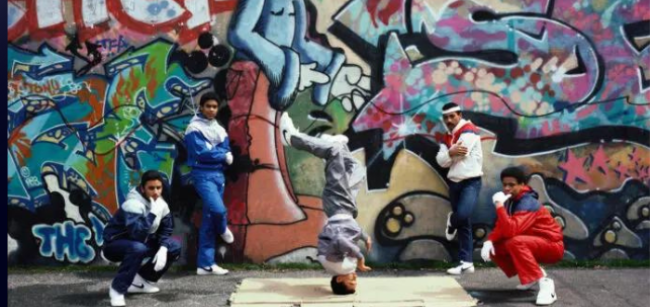 group of people breakdancing