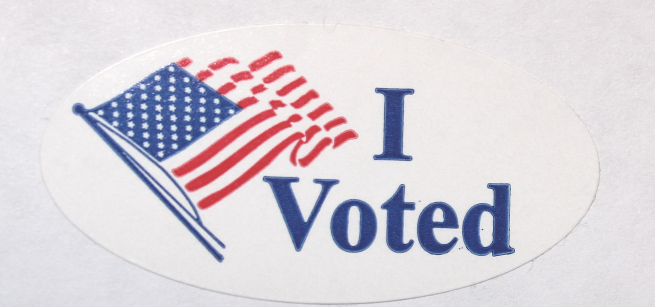 sticker with USA flag that reads I voted