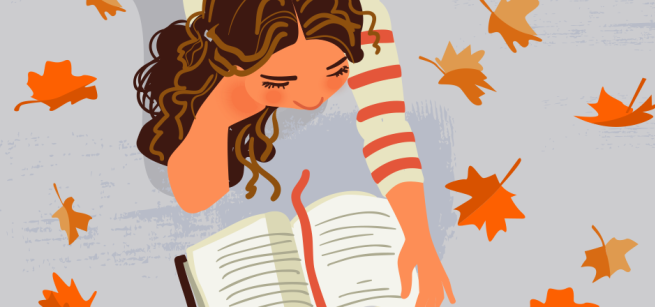 Girl reading book surrounded by fall leaves