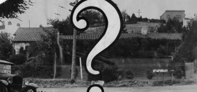 House with a question mark over it