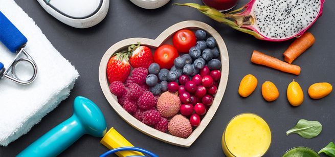 Heart shaped container with assorted fruits.