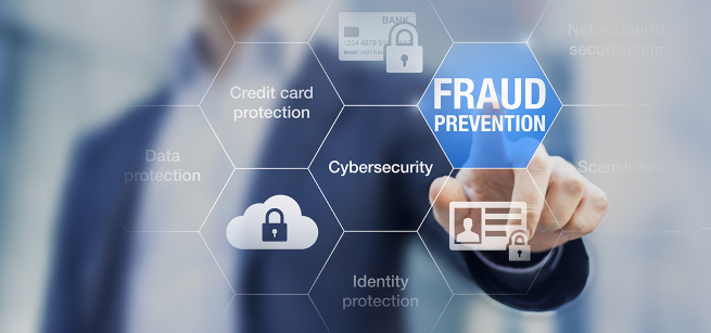 Man in blue jacket with white shirt pointing at a fraud protection sign