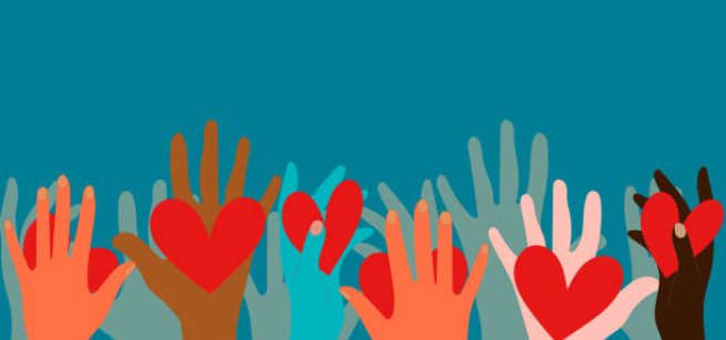 sea of hands holding hearts