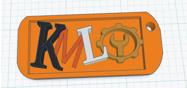 A picture of a digital 3D keychain with the letters K, M, and L on it