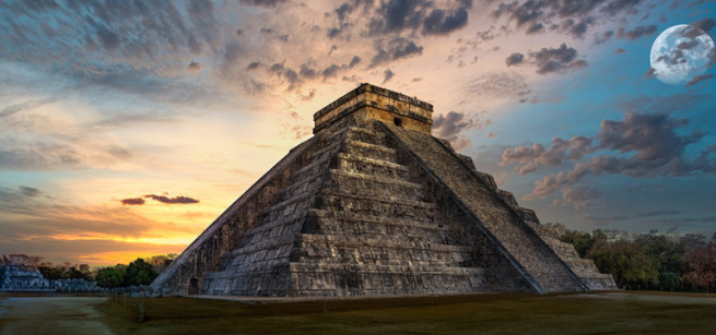 pyramid and ancient temple in the background