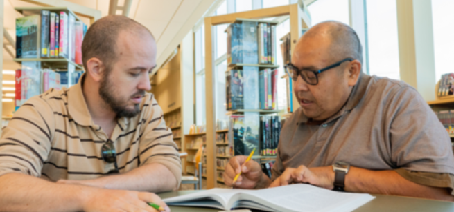 tutor with adult literacy student