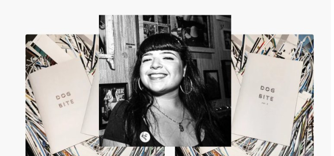 Photographer Desi pictured in front of her photo zines