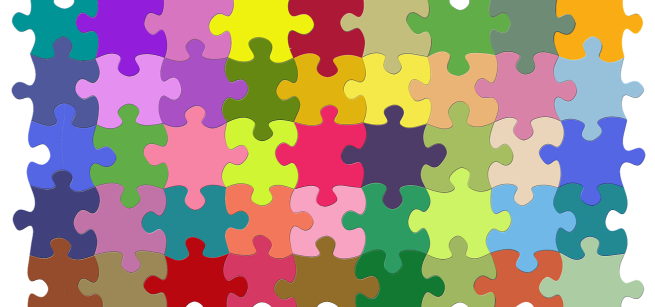 Many colored puzzle pieces