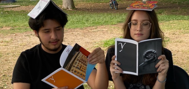 Two zine makers with several zines