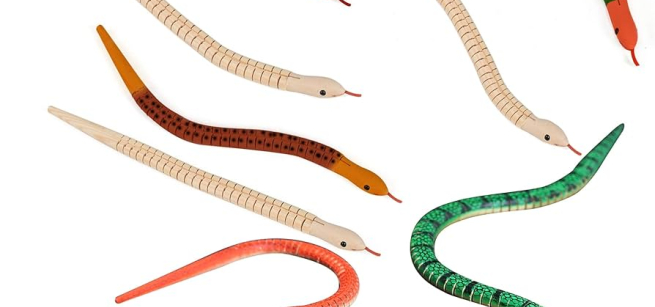 Painted and unfinished wooden snakes