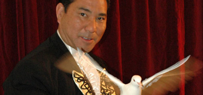 magician with a dove